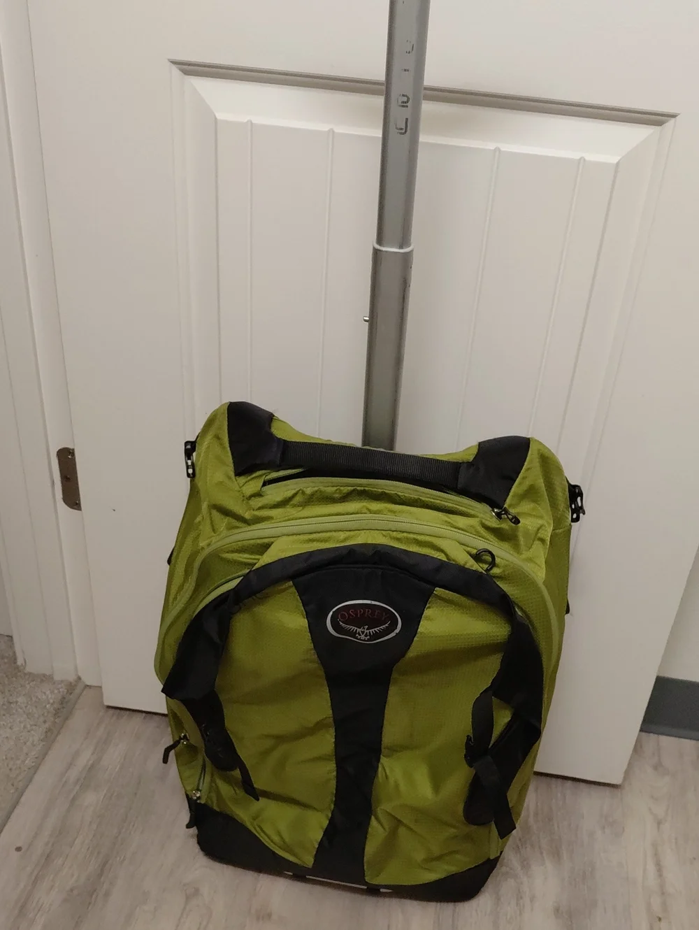 OSPREY Green and Black Travel Backpack Carry On With Wheels
